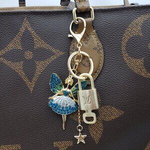 Authentic Louis Vuitton Lock & Key with Unbranded Fairy Charm, Keychain